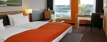 Double bed in the Superior Room with an amazing view in the ATLANTIC Hotel Kiel