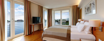All-round water view from the bed room of the Executive Suite at ATLANTIC Hotel Wilhelmshaven