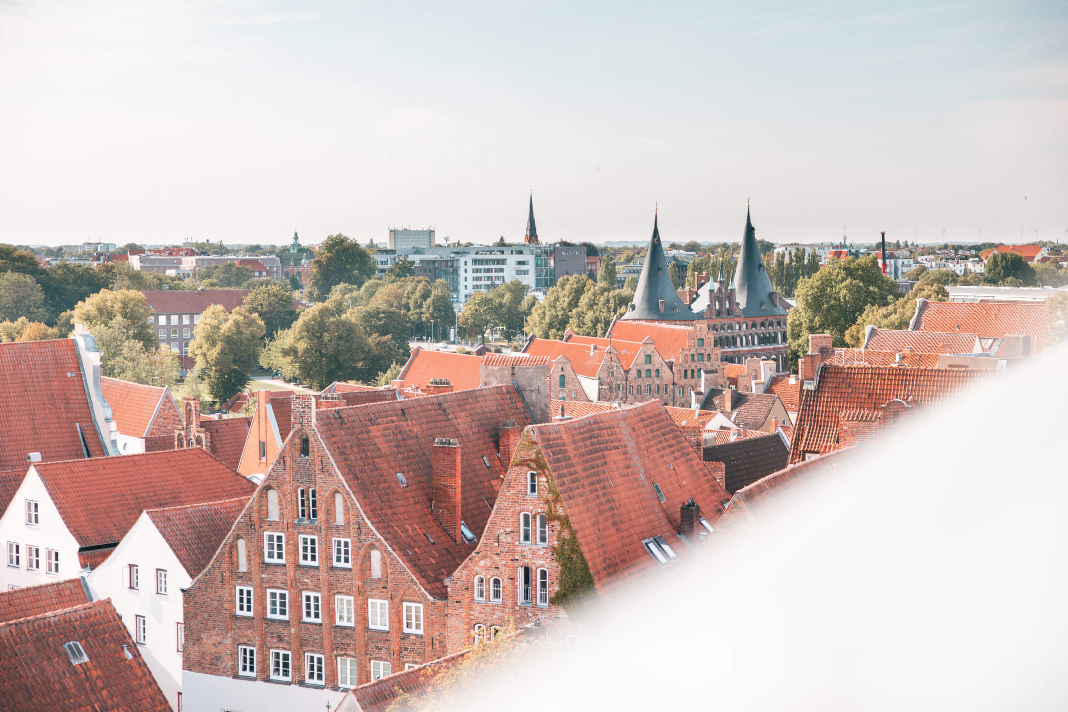 ATLANTIC Hotel Lübeck hotel room view old town ATLANTIC Hotel Lübeck room view old town side with Holsten Gate and old salt warehouses