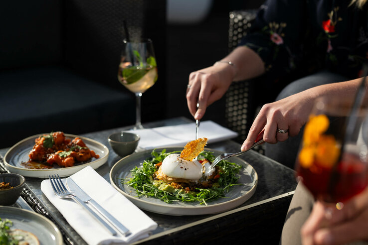 ATLANTIC Hotel Kiel Bar Deck 8 Table set with wine and food on deck 8 Kiel