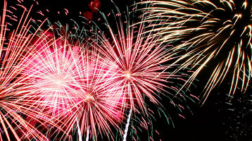 New Year's Eve at the ATLANTIC Hotel Münster Colorful fireworks light up the night sky over Münster, festive atmosphere at the ATLANTIC Hotel.