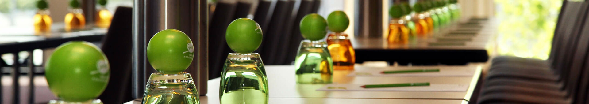 Conference room Förde in the ATLANTIC Hotel Kiel Conference table in the ATLANTIC Hotel Kiel with chairs, writing materials and drinks, ready for a meeting.